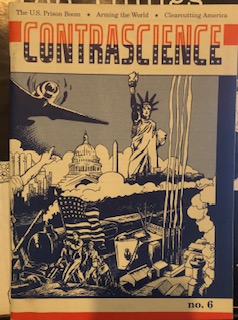 Blue monochrome graphic of traditional symbols of US nationalism and industrial power, including: The Statue of Liberty, The United States Capitol, smokestacks, a train, and a long line of people led by a person carring an American flag. The title of the zine is above this graphic, in capital letters, the top half of the font is red and the bottom half is blue with white stars.