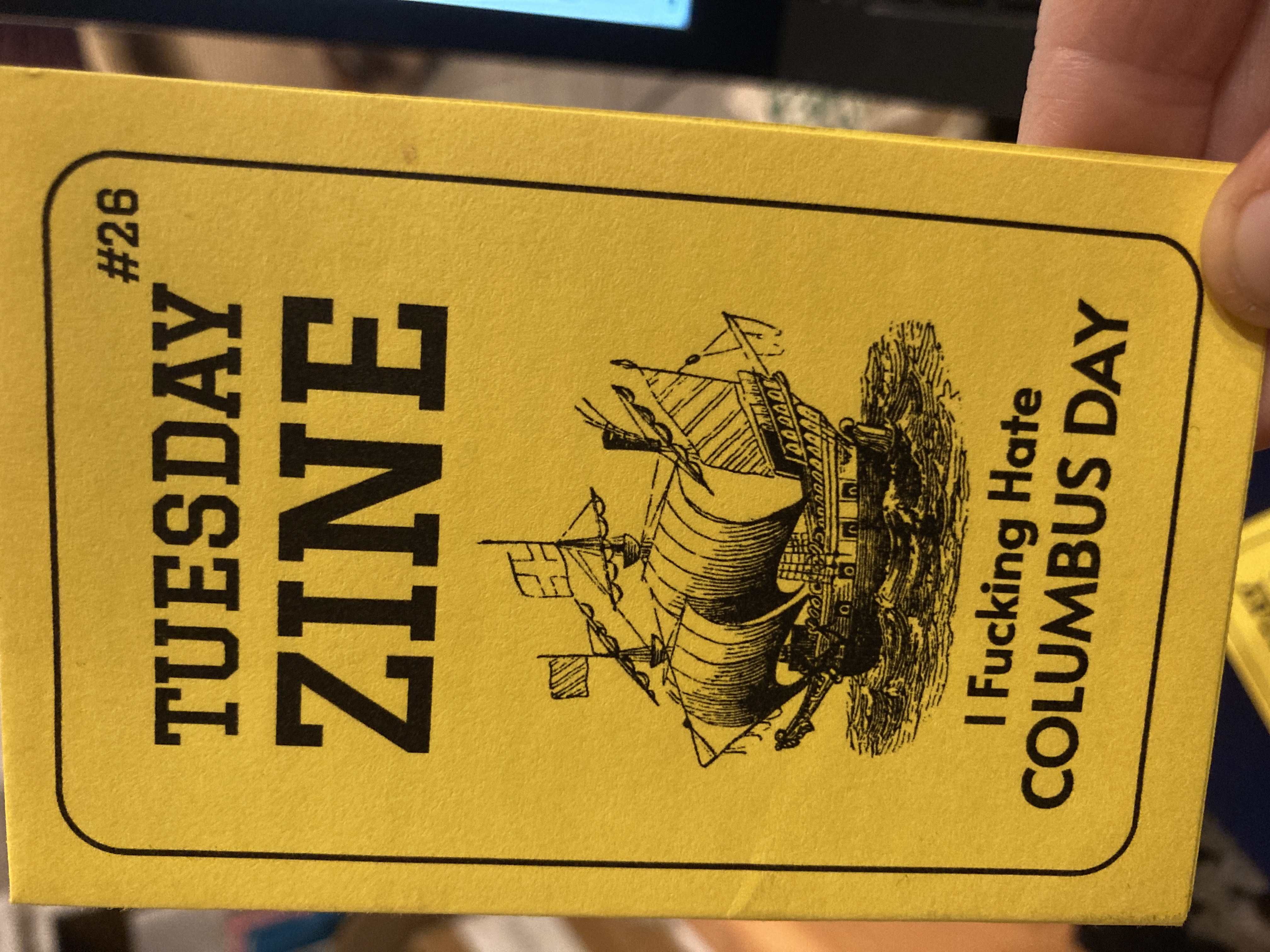 Cover of the Tuesday Zine, which shows an illustration of an old sailing ship and the title of the zine